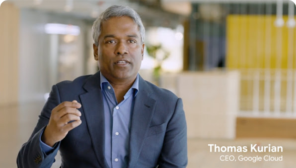 CEO of Google Cloud, Thomas Kurian, facing camera in a blue suit