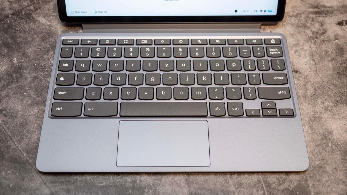 Lenovo Chromebook Duet 11's keyboard on a gray marbled table.