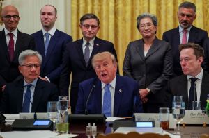 President Trump seated with Nvidia CEO Jensen Huang (left) and Elon Musk (right). Other tech executives like OpenAI president Greg Brockman stand behind them.
