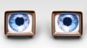 Two old fashioned TV sets with blue eyes in each, set up to look like eyes looking out