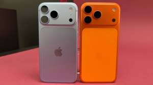 A silver iPhone 18 Pro next to an orange iPhone 17 Pro against a pink background.