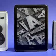 Three e-readers on a purple background