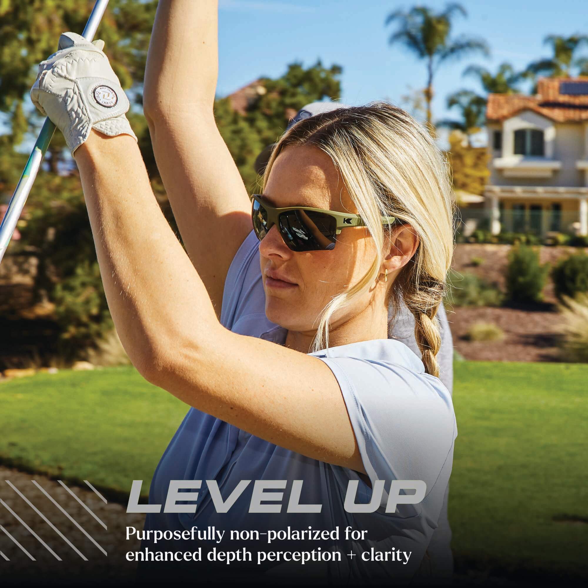 Level Up. Purposefully non-polarized for enhanced depth perception + clarity. Woman wearing Full Focus Flight Paths Sunglasses.