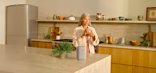 Photo of a woman drinking tea in a kitchen