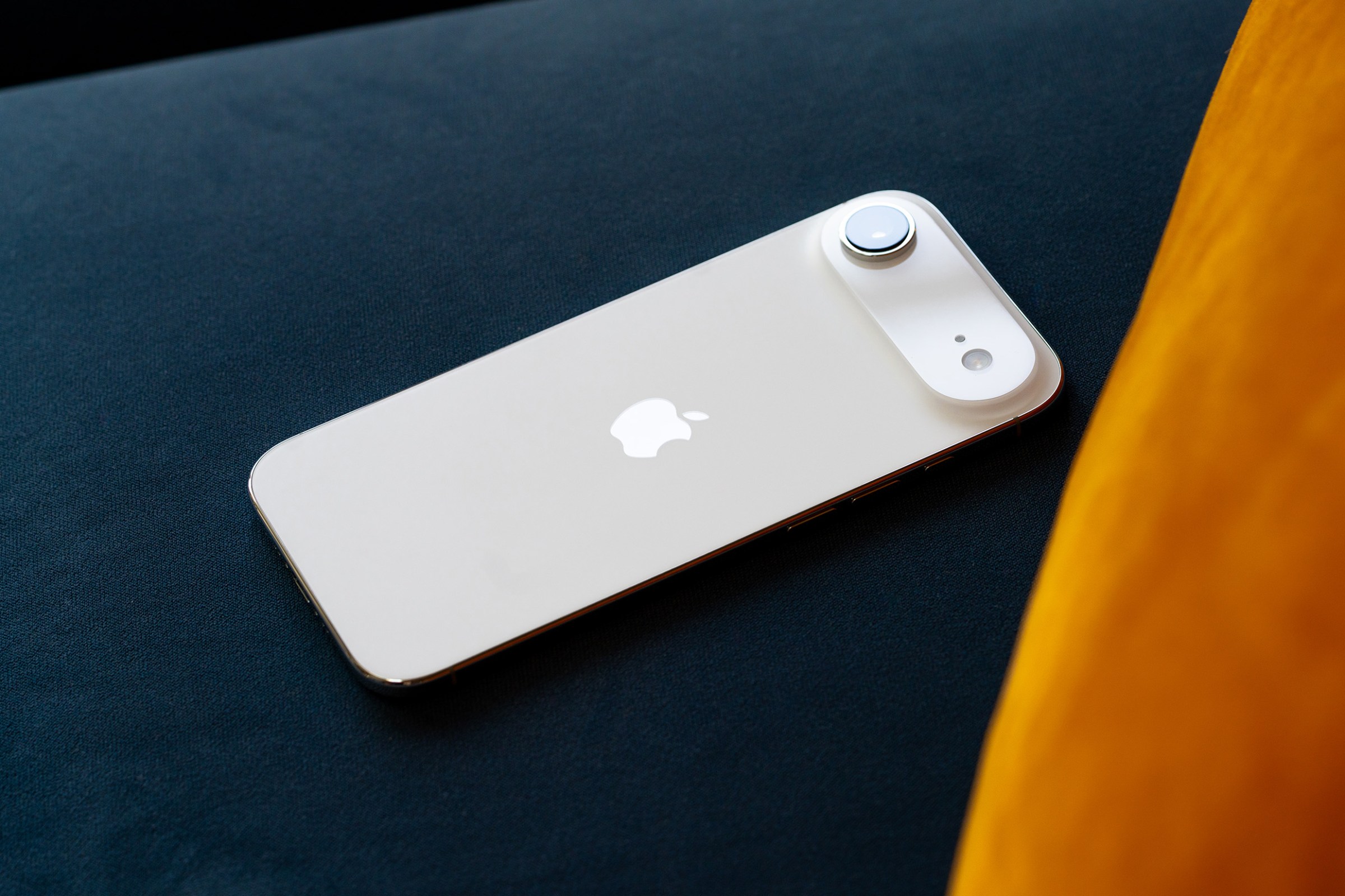 iPhone Air on a couch cushion